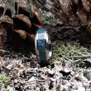 Dragon scale opal and copper shavings on titanium